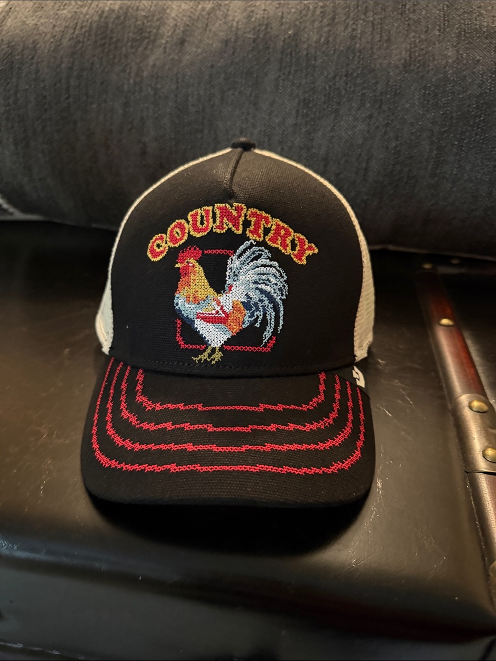 Black Trucker Hat with Embroidered Rooster and Red Accent Stitching